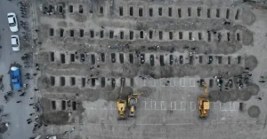 Graves are being prepared after a strike on a school in Minab Iran 768x402 2